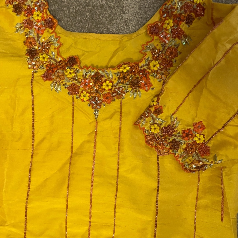 Traditional shalwar suit in raw silk with hand work